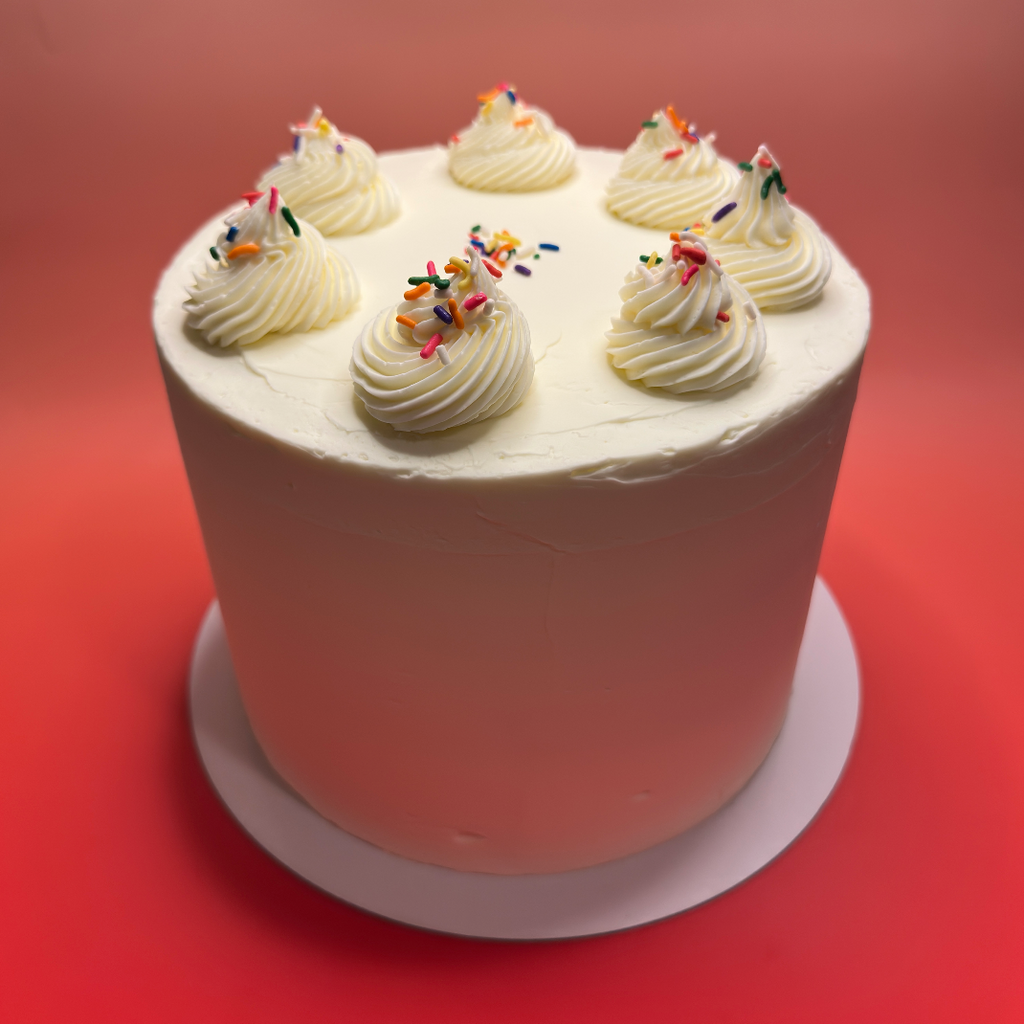 confetti cake, sprinkles, icing, chantilly cream, vanilla spongecake