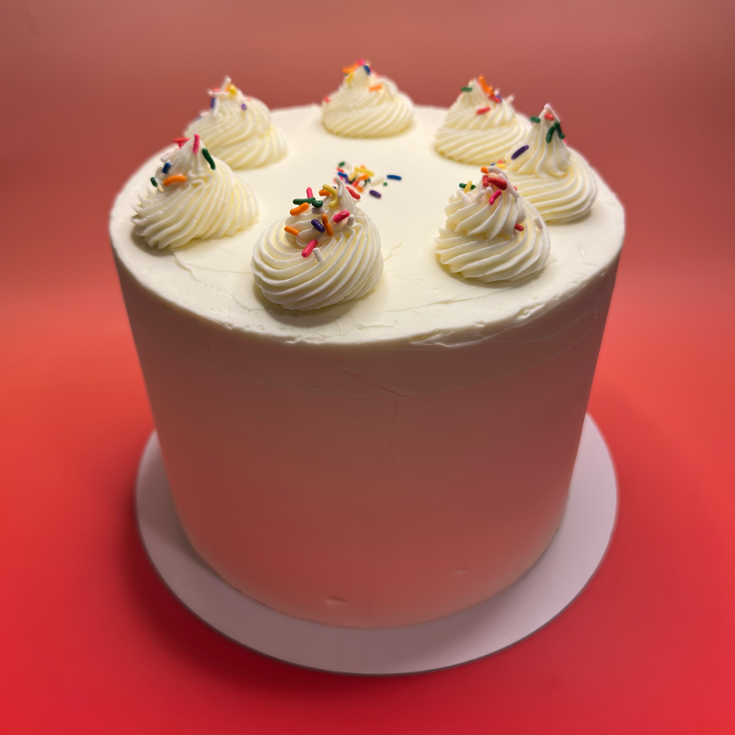 confetti cake, sprinkles, icing, chantilly cream, vanilla spongecake