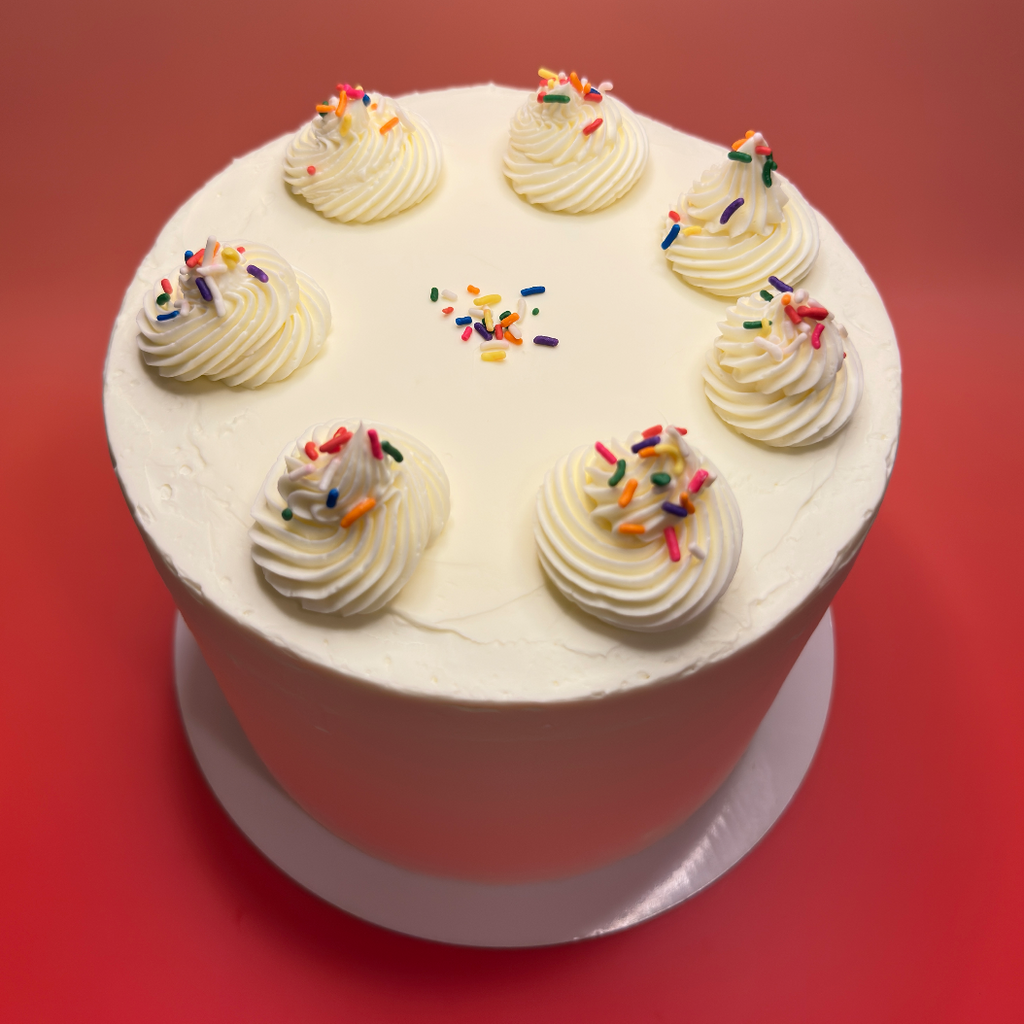 confetti cake, sprinkles, icing, chantilly cream, vanilla spongecake
